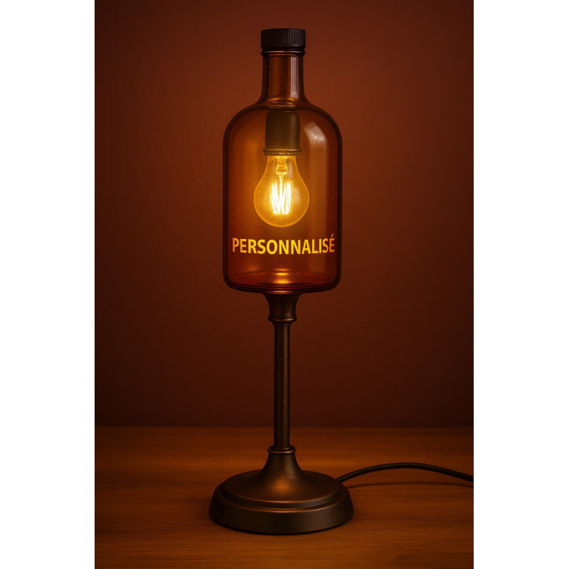 Offrez une lampe personnalisable en verre givré avec base en métal bronze. Un éclairage chaleureux et perssonalisable.